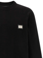 Dolce & Gabbana schwarzer Baumwoll-Sweatshirt mit Lederpatch und Logo-Tag