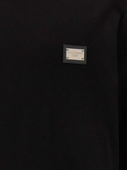 Dolce & Gabbana schwarzer Baumwoll-Sweatshirt mit Lederpatch und Logo-Tags