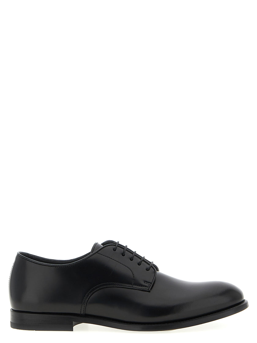Doucal's Schwarze Oxford- und Derby-Schuhe aus Kalbsleder