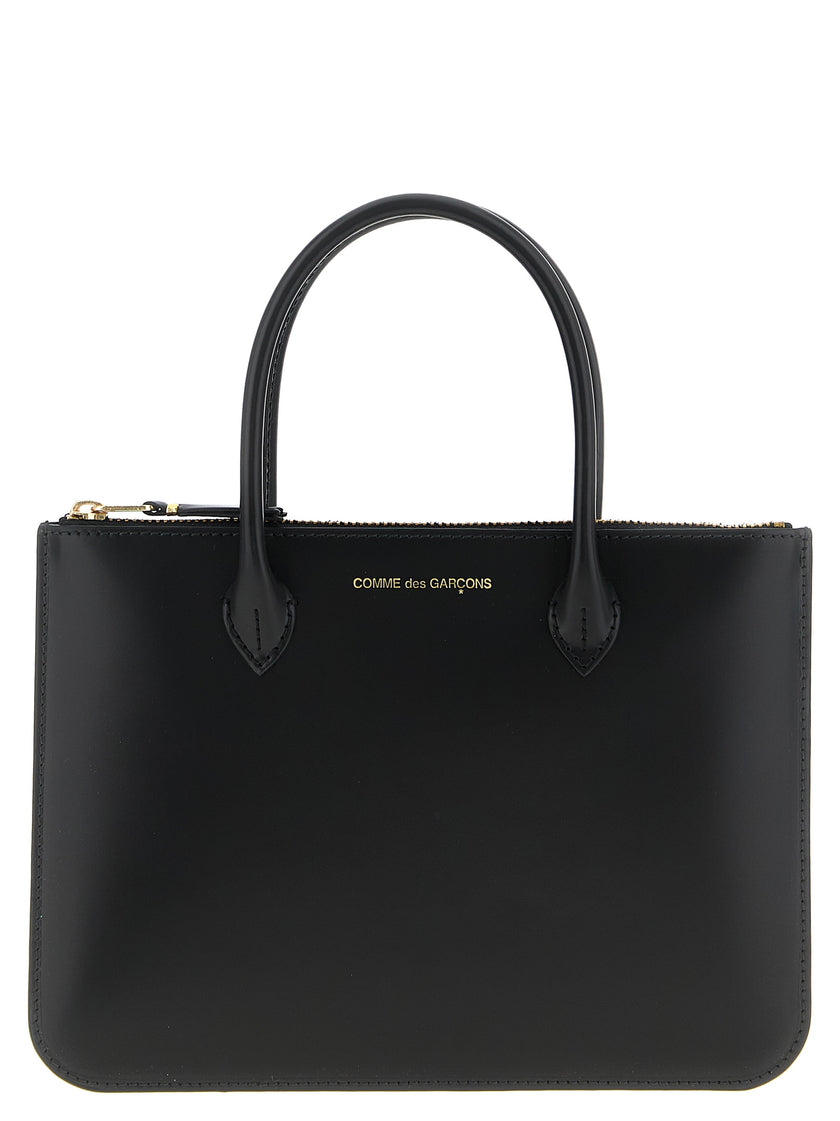 Comme Des Garçons Schwarze Kalbsleder-Handtasche