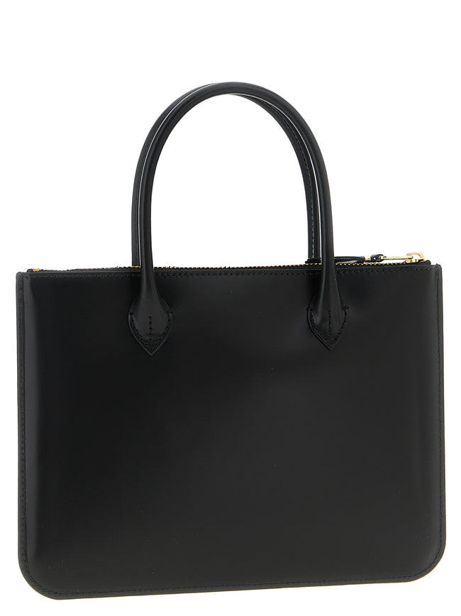 Comme Des Garçons Schwarze Kalbsleder-Handtasche