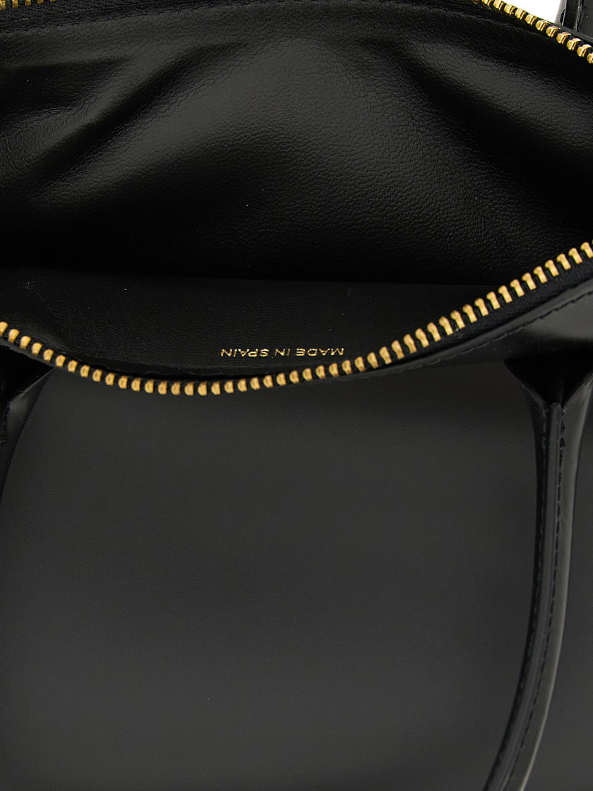 Comme Des Garçons Schwarze Kalbsleder-Handtasche