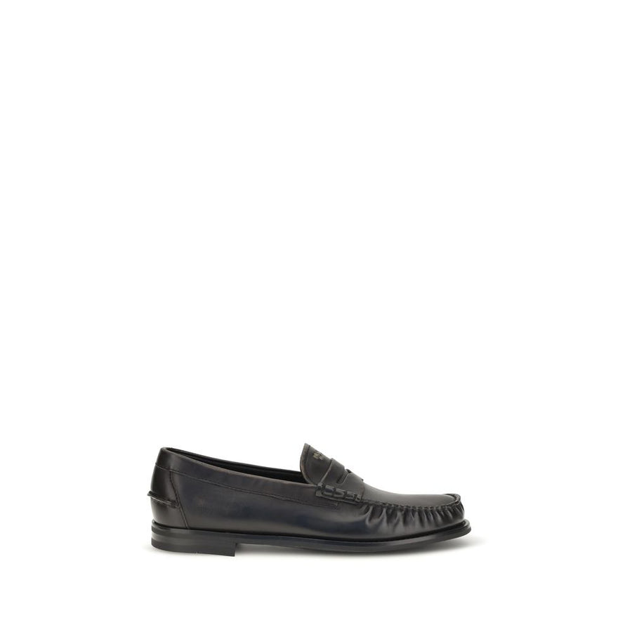 Prada Schwarze "Bos Taurus" Kalbsleder Loafer zum Hineinschlüpfen